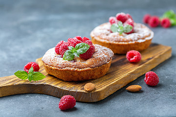 Image showing Delicious raspberry mini tarts (tartlets).