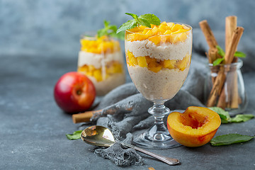 Image showing Rice pudding with nectarine. Delicious breakfast.
