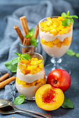 Image showing Rice pudding with nectarine, cinnamon and ginger.