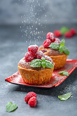 Image showing Raspberry tartlets with almond cream.