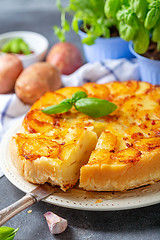 Image showing Sliced traditional potato pie.