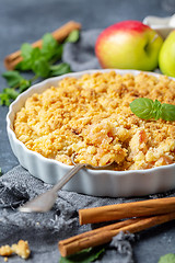 Image showing Apple crumble and a dessert spoon closeup.