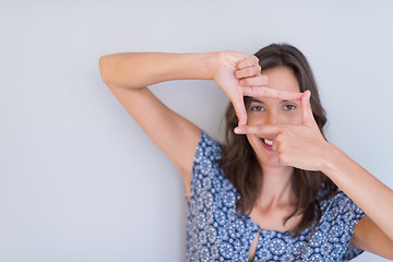 Image showing woman showing framing hand gesture