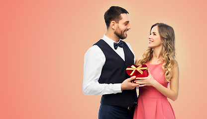 Image showing happy couple with gift on valentines day