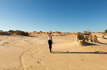 Image showing Woman in a desert landscape in outback Australia