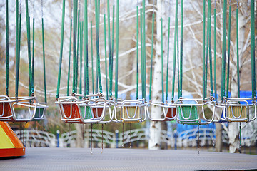 Image showing Empty chain swing in amuzement park