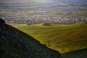 Image showing View onto the village from mountains 