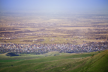 Image showing High angle view onto the green fields and villages