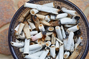 Image showing Cigarette buts in an ashtray