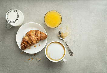 Image showing Breakfast with coffee and croissant