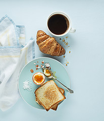 Image showing Breakfast with coffee and croissant