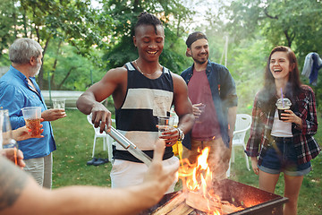 Image showing Group of friends making barbecue in the backyard. concept about good and positive mood with friends