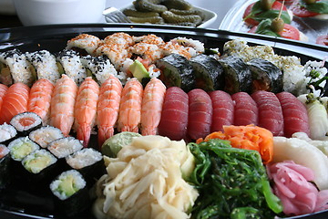 Image showing Different kind of sushi as salmon, tuna, rolls and so on