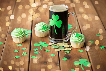 Image showing shamrock on glass of beer, green cupcake and coins