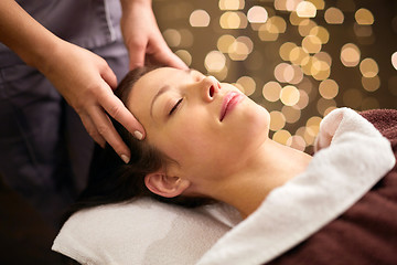 Image showing woman having head massage at spa