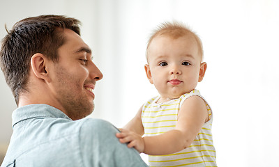 Image showing father with little baby daughter at home