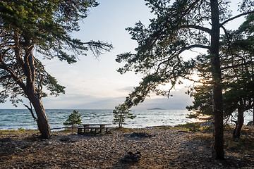 Image showing Benches and table in an evening view by the coast of the Baltic 