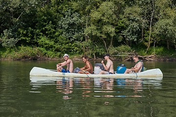 Image showing Canoes on the Riverside