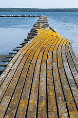 Image showing Broken old jetty in yellowish color