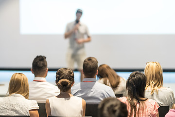 Image showing Male business speaker giving a talk at business conference event.