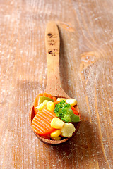 Image showing vegetablesi on a wooden spoon