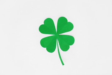 Image showing green paper shamrock on white background