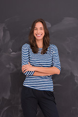 Image showing woman standing in front of chalk drawing board