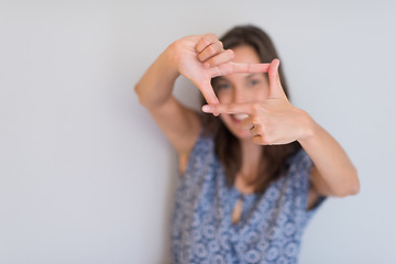 Image showing woman showing framing hand gesture