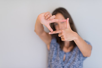 Image showing woman showing framing hand gesture
