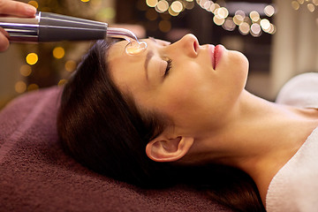 Image showing woman having hydradermie facial treatment in spa