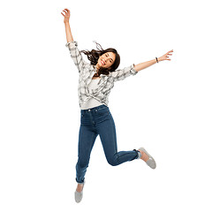 Image showing happy young woman or teenage girl jumping