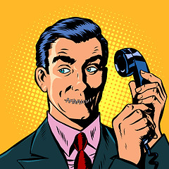 Image showing mouth shut. serious man talking on a retro phone