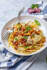 Image showing Linguini with chanterelles, parmesan and herbs.