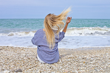 Image showing Beautiful girl in sea style on the Adriatic beach. Travel and va