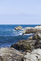 Image showing Blue sea water, stones and rocks on Adriatic sea coast.