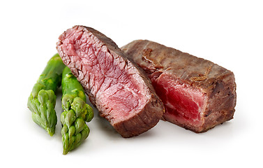 Image showing beef wagyu steak meat with asparagus isolated on wight backgroun