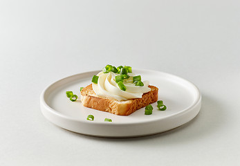 Image showing plate of toasted bread with cream cheese