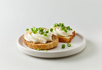 Image showing plate of toasted bread with cream cheese