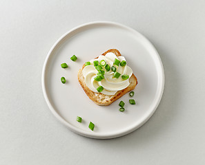 Image showing plate of toasted bread with cream cheese