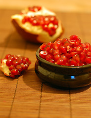 Image showing broken ripe pomegranate fruit and seeds
