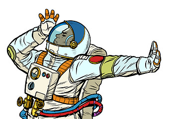 Image showing Astronaut in a spacesuit. Gesture of denial, shame, no