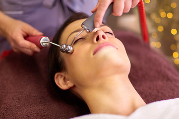 Image showing woman having hydradermie facial treatment in spa