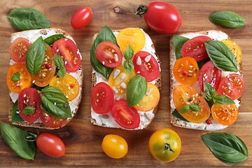 Image showing Sandwiches with cheese and tomatoes.