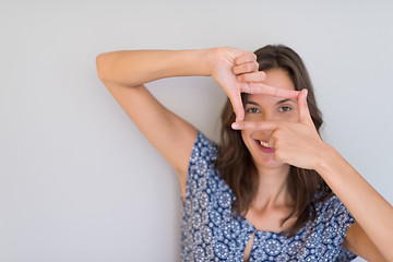 Image showing woman showing framing hand gesture