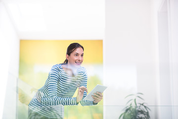 Image showing young woman at home websurfing