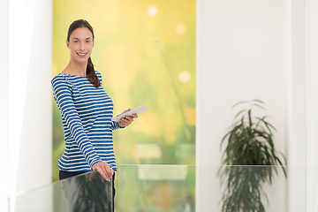 Image showing young woman at home websurfing