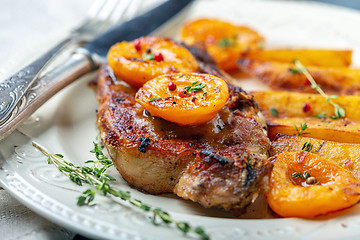 Image showing Entrecote of pork with apricots and thyme.