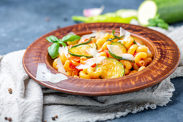 Image showing Pasta with zucchini, tomatoes and Parmesan.