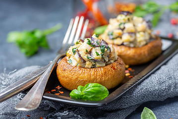 Image showing Stuffed mushrooms with eggplant and herbs.