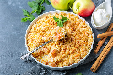 Image showing Apple crumble with cinnamon for breakfast.